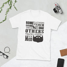 Load image into Gallery viewer, Some Fathers Teach Their Sons To Shave, Others Teach Them To Be Men Unisex T-Shirt